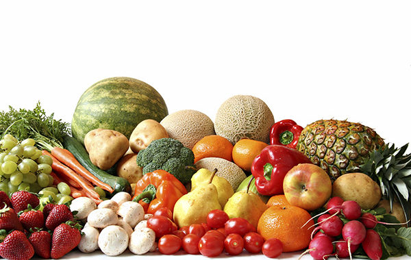 A colorful assortment of fresh fruits and vegetables arranged together.